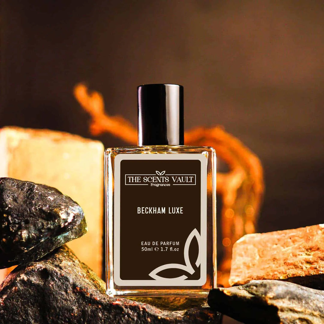 Beckham Luxe Eau de Parfum (50ml) from The Scents Vault, elegantly displayed with a rugged stone backdrop, emphasizing its luxurious appeal.