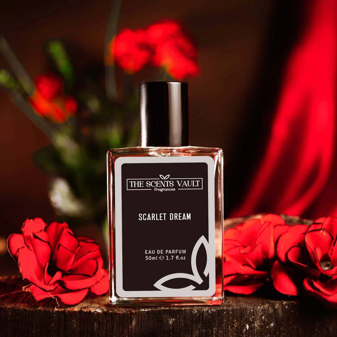 Scarlet Dream fragrance by The Scents Vault, displayed with red roses as a background, 50ml Eau de Parfum bottle.