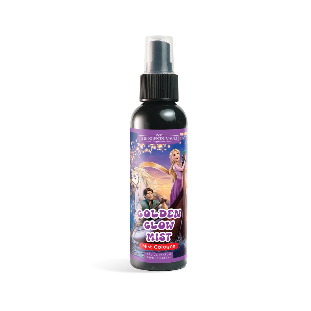 A bottle of Golden Glow Mist fragrance with a label featuring illustrations of children and a magical theme, indicating that it is a sparkling body mist designed for kids.