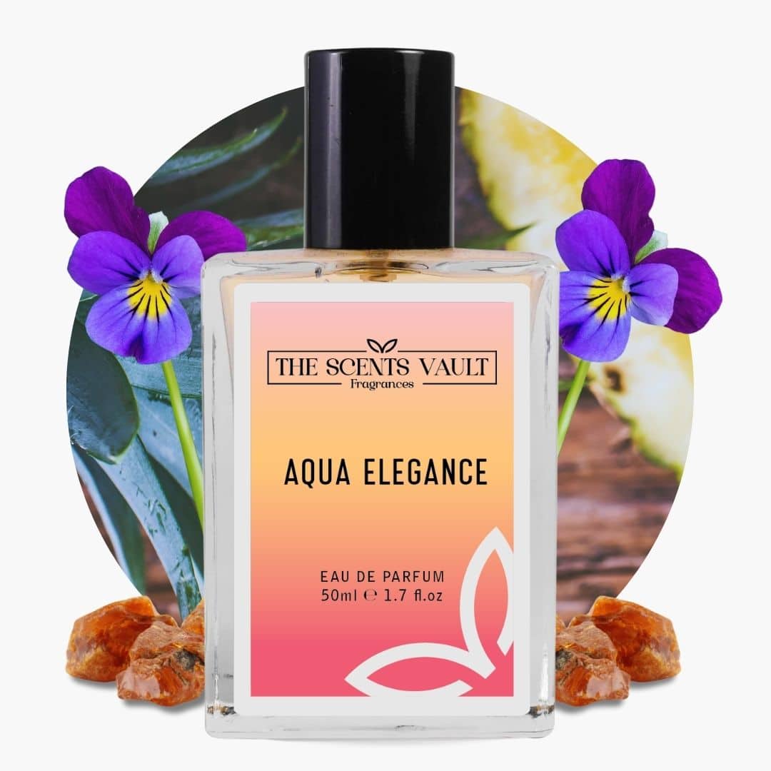 The Scents Vault Aqua Elegance perfume bottle with a black cap, placed against a botanical background of purple violets and amber resin.