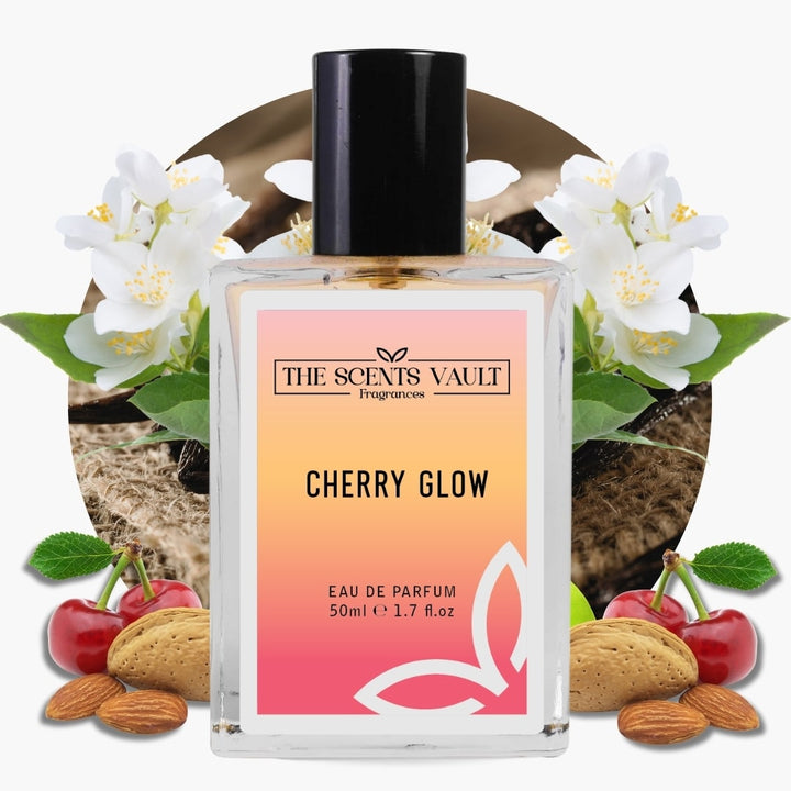 Perfume bottle labeled 'Cherry Glow' by The Scents Vault with floral and fruit elements in the background.